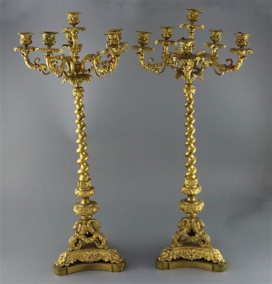 A pair of 19th century French ormolu six light candelabra, height 28in. diameter 12in.